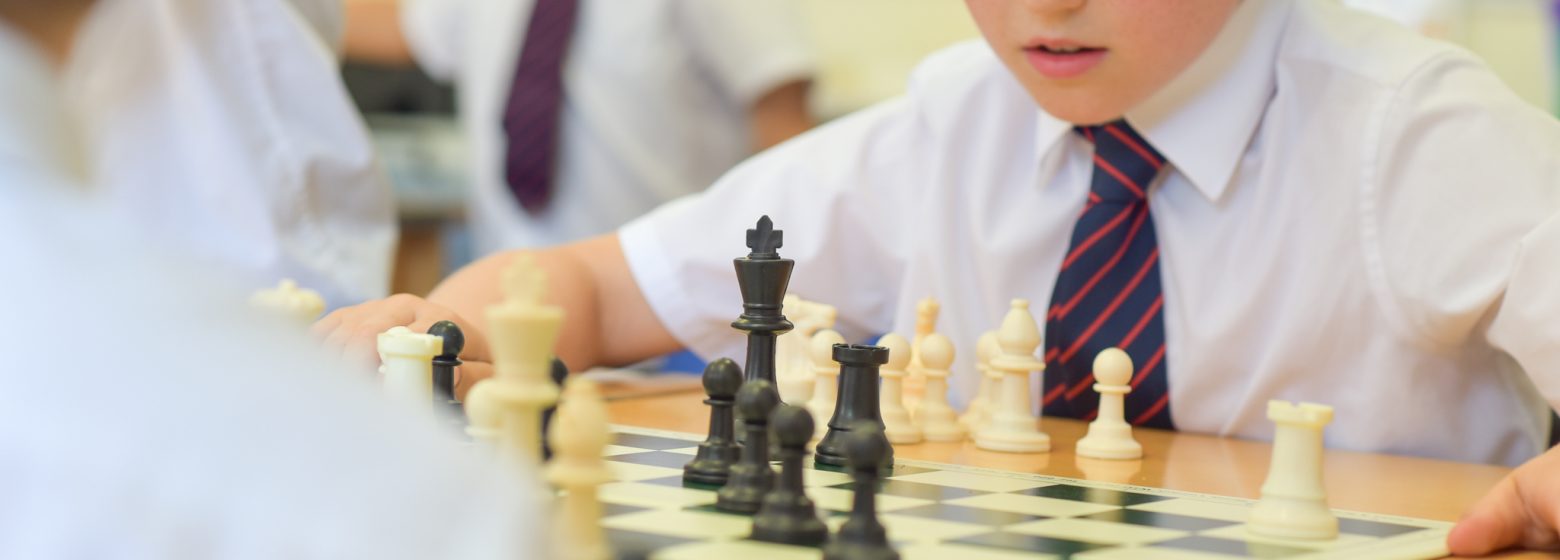 Child Playing Chess