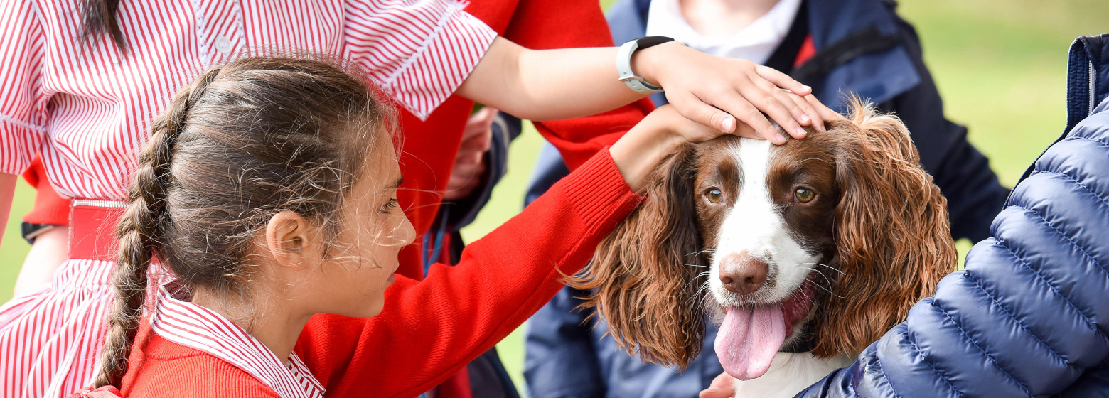 school girl with dog