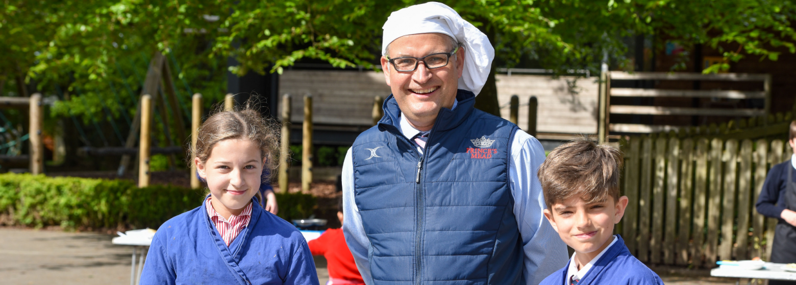 teacher with chefs hat