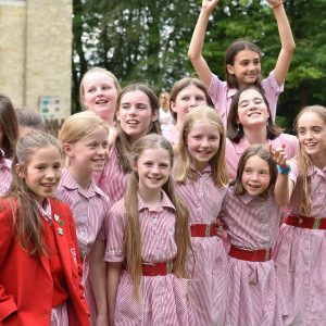 a group of girls smiling