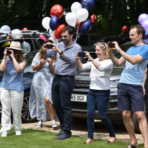 parents taking pictures at a prep school in Hampshire