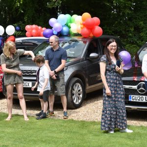 cars with balloons parked up