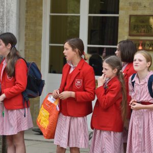 girls from a prep school in Hampshire waiting in line