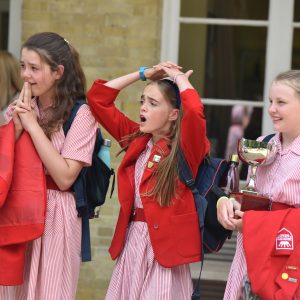 children from a prep school in Hampshire standing and looking shocked