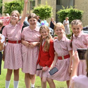 girls from a prep school in Hampshire posing for a camera