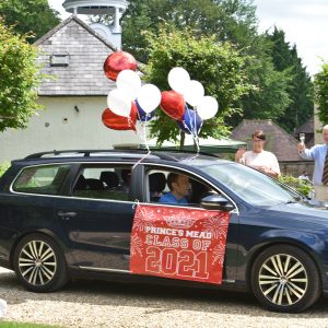 a car with a class of 2021 banner